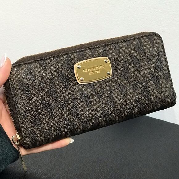 Michael Kors Handbags - Michael Kors Jet Set Brown MK Signature Logo Large Zip Wallet Clutch